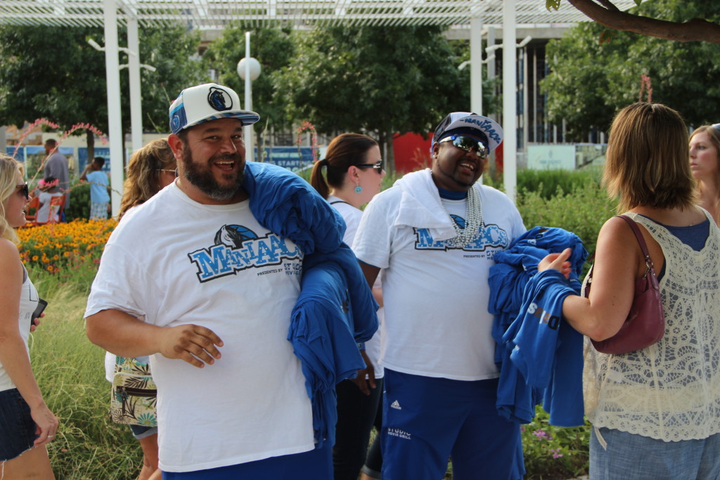 Two Mavs "Maniaacs" helped pass out shirts at "Love in the Streets" that read, "#DallasStrong."