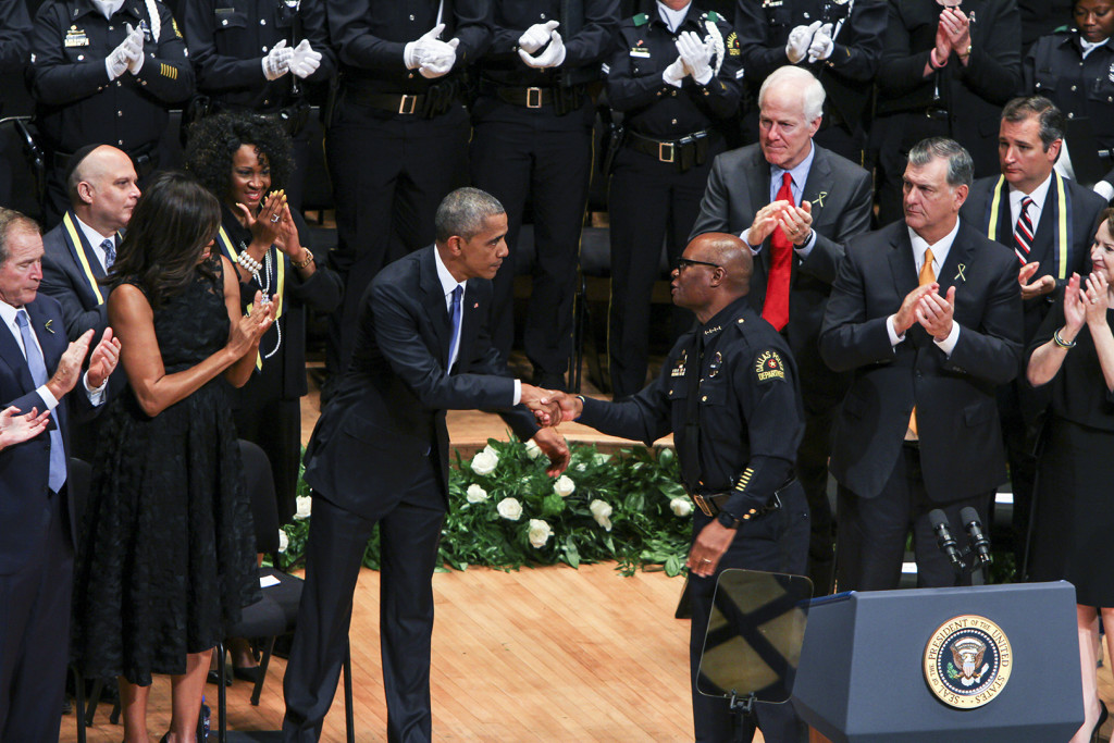 President Obama shakes Dallas Police Chief David Brown's hand in thanking him for his leadership in the face of tragedy due to the shooting on July 7.