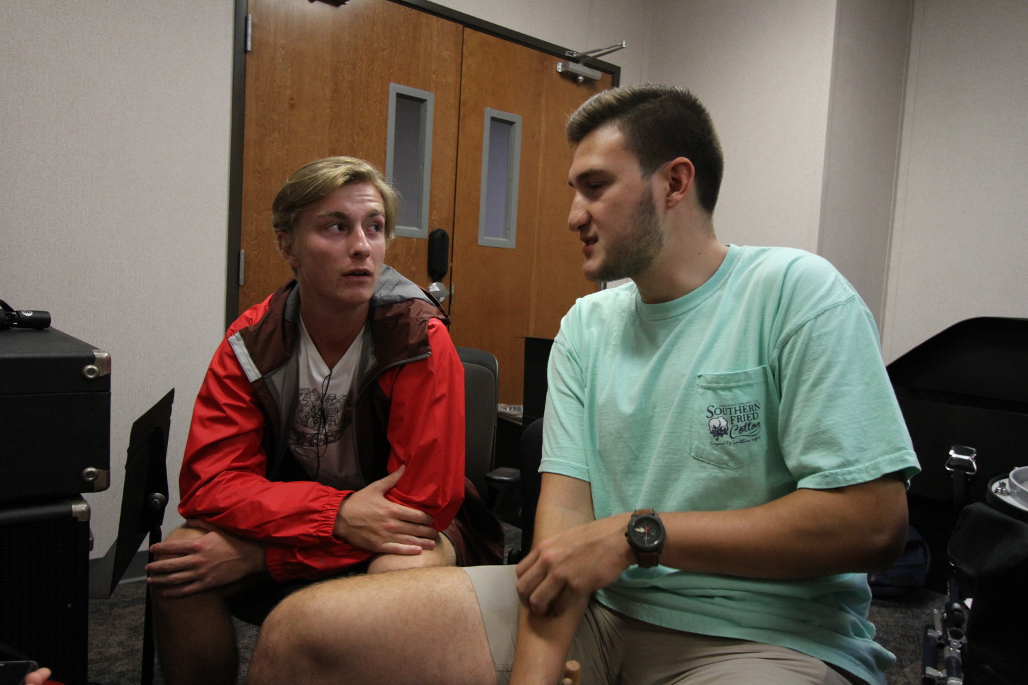 Political science sophomore Jacob Munoz (right) and global business freshman Andrew Alston await their turn to try out for the quints. Photo by Yash Musalgaonkar | Mercury Staff.