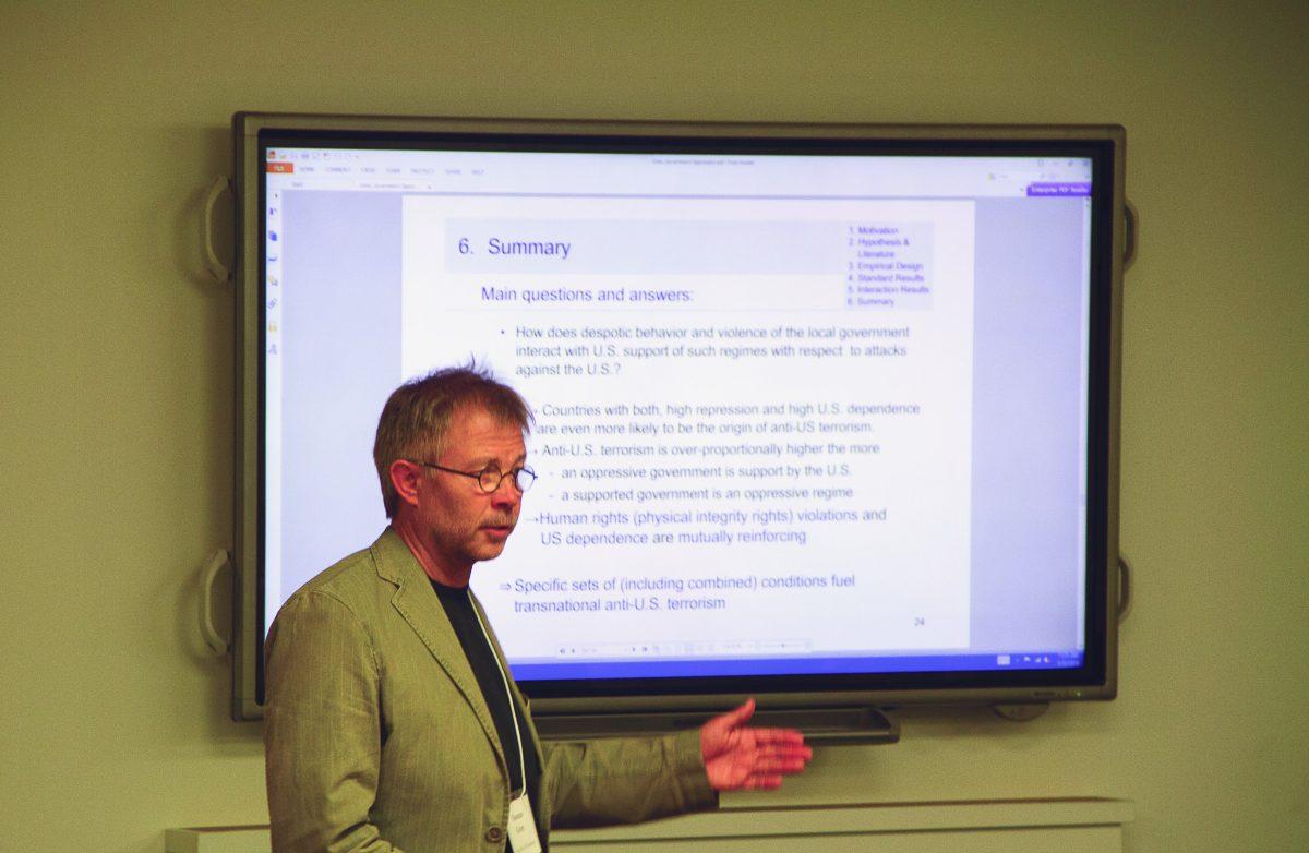 Esteban Bustillos| Managing Editor
Thomas Gries, an economics professor from the University of Paderborn in Germany, presents his paper on the link between terrorism and the United States’ support for oppressive governments.