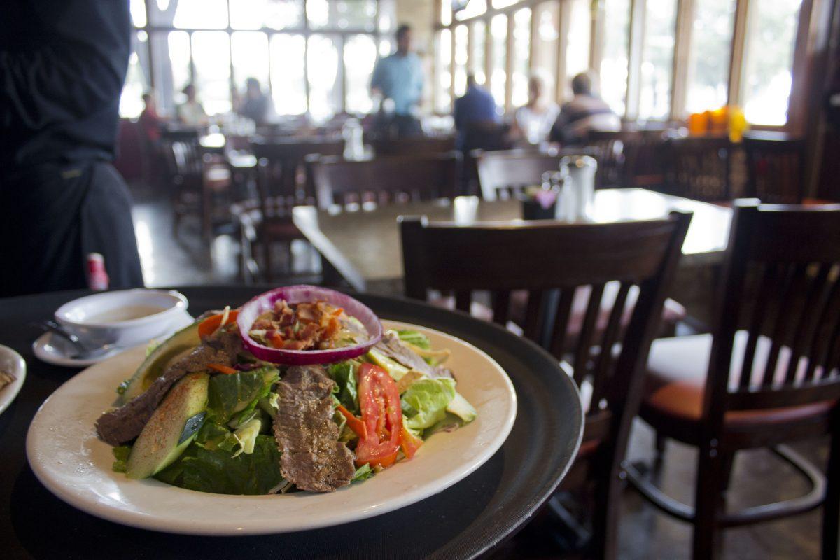 Connie Cheng|Photo Editor
Manny’s C.H. salad is served with grilled, spicy beef fajita and ranchero sauce. Manny’s Uptown Tex-Mex Restaurante serves breakfast all day and opened at Coit and Campbell on Aug. 1.