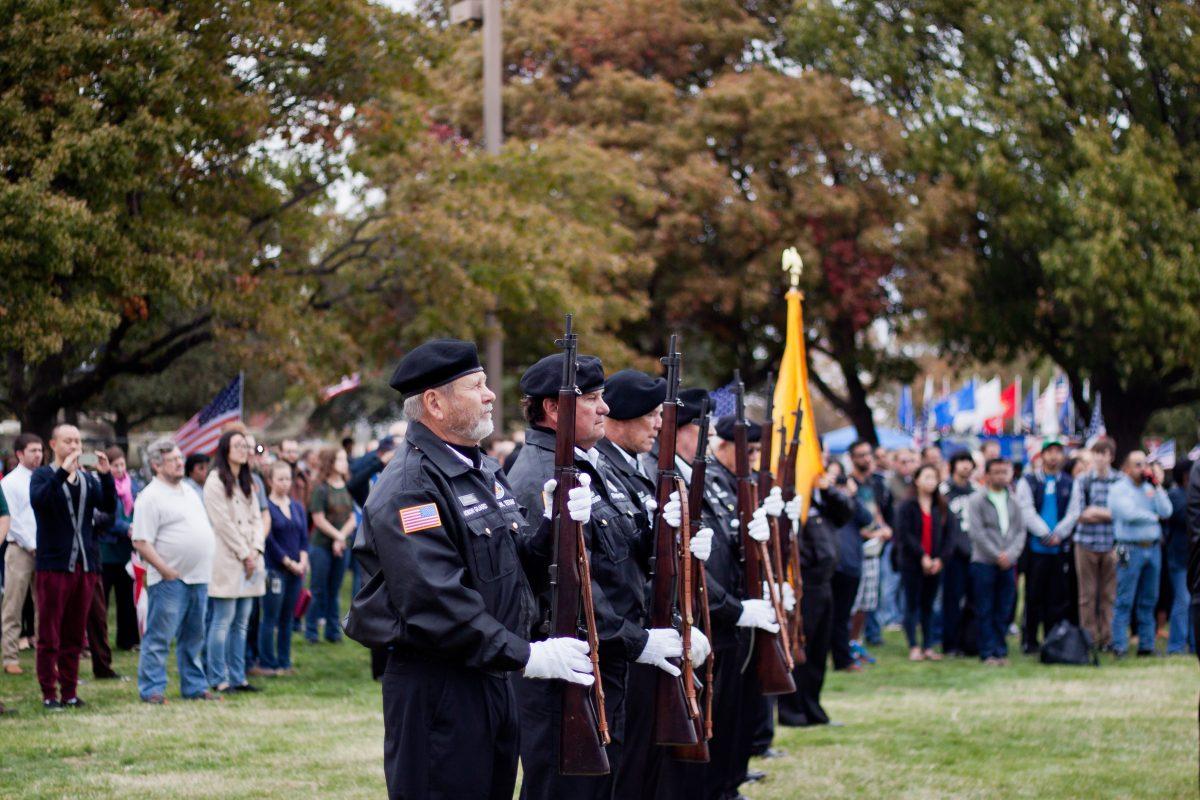 Chris Lin
Observers stood in still silence as the honor guard from a local Vietnam Veterans of America chapter performed the gun salute.