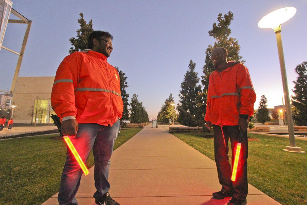 Andrew Gallegos| Asst. Photo Editor
Information technology and management master’s student Kishore Kumar (left) makes the rounds around campus as a member of the Student Patrol alongside Edwin Hampton, a psychology senior. 