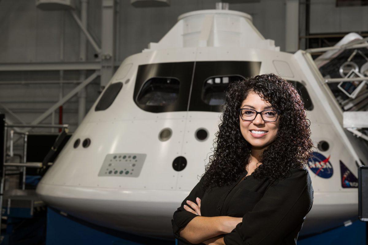 PHOTO DATE: 07-27-15
LOCATION: Bldg. 9NW - Orion Mockup Floor
SUBJECT: Portrait of Christina Deoja in front of Orion medium fidelity mockup for news article from my alma mater (University of Texas at Dallas).
PHOTOGRAPHER: BILL STAFFORD