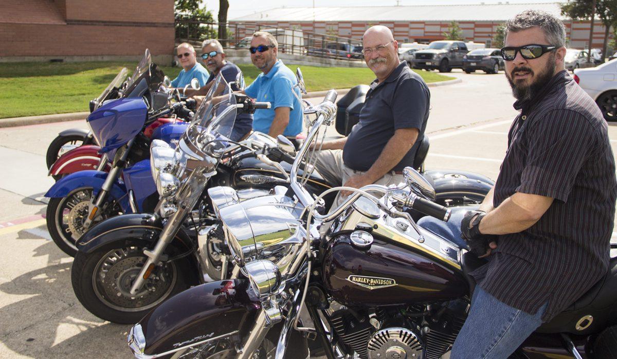 Systems Analyst Scott Steffan (third from left) and IT Manager Richard Marler (second from right) competed in the 2016 Corporate Challenge: the Great Ride motorcycle ride — an event that is almost 90 miles — with other members from UTD. Photo by Ruth Varghese | Mercury Staff.