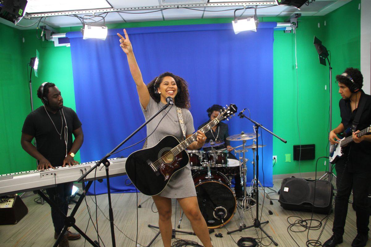 Interdisciplinary studies senior Maya Hook and her band, Maya Piata, performed tracks from their upcoming record “Sunny Days” on Sept. 24 in UTD TV’s studio. Hook said the record is set to release in October. Photo by Sid Patel | Mercury Staff.