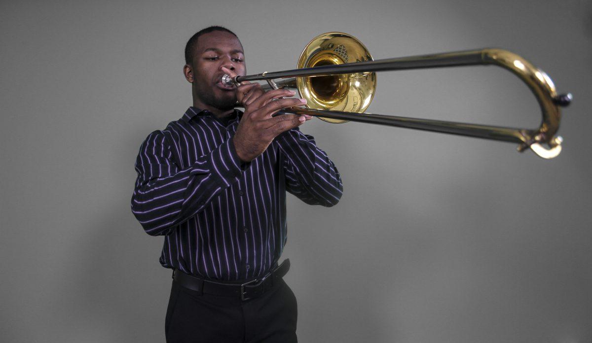 Macs Reynolds, an interdisciplinary studies senior, said he was drawn to jazz because it freed him from the confines of classical music. Now, he directs his own jazz band. Photo by Saher Aqeel | Mercury Staff.