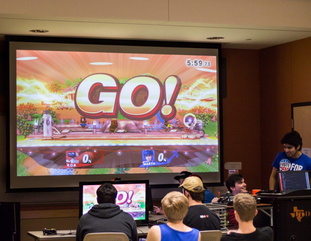 Members of Comet Clash gather for a game of “Super Smash Brothers.” Top players compete for a $75 prize and a custom controller at the end of the semester. Photo by Robert Johnson | Mercury Staff.