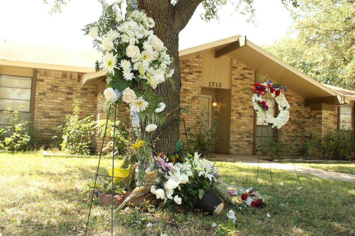 Family and friends created a makeshift memorial in front of the Plano home where former student Spencer Hight killed his estranged wife, Meredith Hight and seven other people on Sept. 10. This shooting had the largest casuality in the city’s history. Photo by Saher Aqeel | Photo Editor.