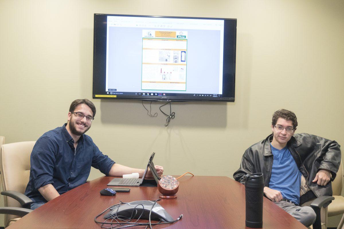 Alumni Vinay Naik (left) and Matthew Galles helped develop the C-section technology along with other members of the UTDesign group, Little Caesareans.The device will help medical professionals perform C-sections without injuring the baby’s head during the operation. Photo by Anupam Gupta | Mercury Staff.