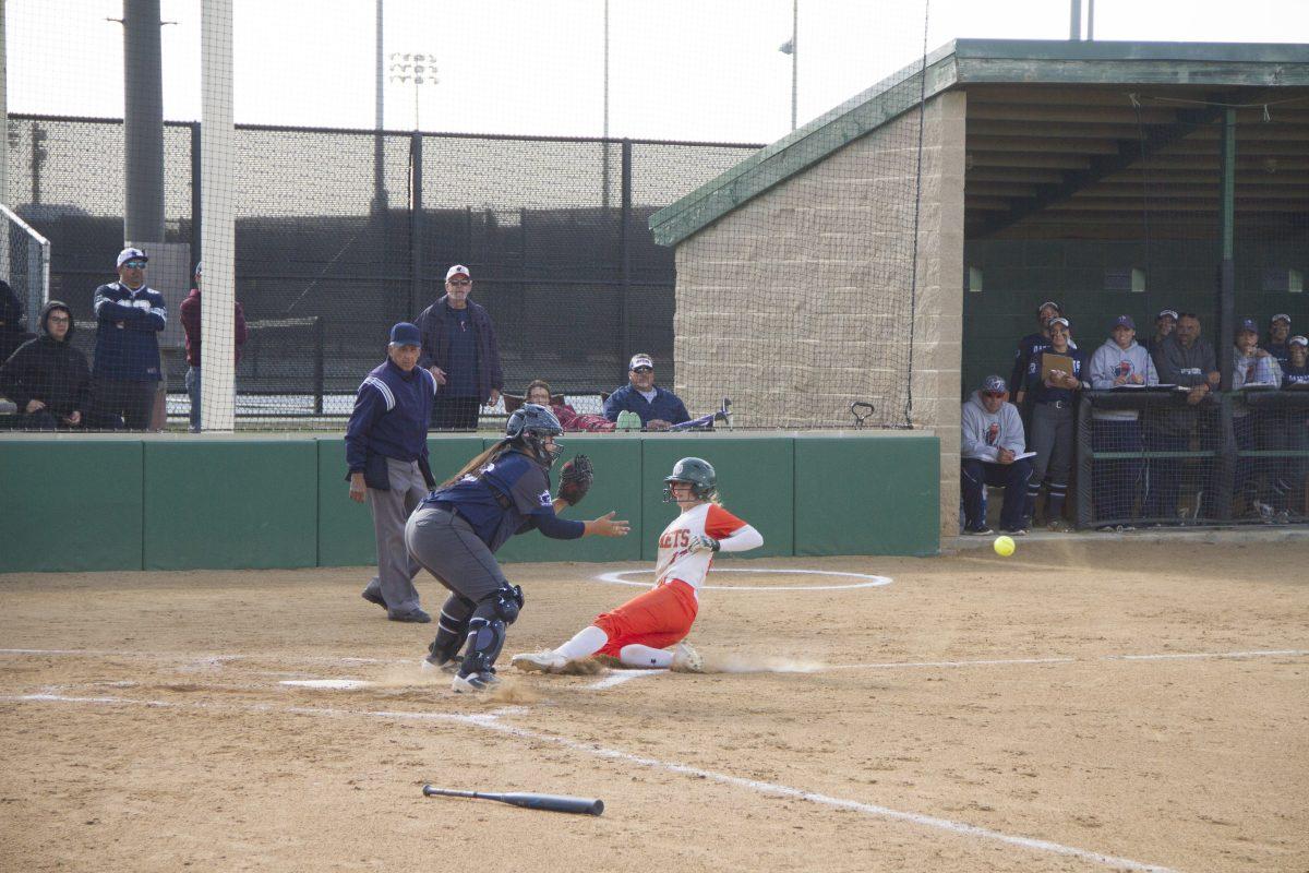 Senior outfielder Stefanie Polderman slides into home base during the first of three games against UT Tyler. The Comets were swept by the Patriots in a three-game series that started on April 14. Photo by Achint Khanijo | Mercury Staff.