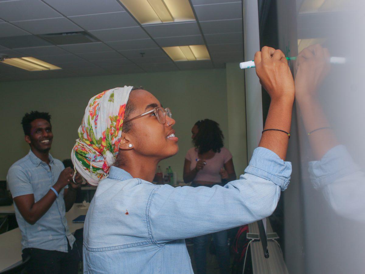 History graduate Madiina Ssali said the reopening of the Ethiopian-Eritrean border was a positive step for African unity. Photo by Pavan Tauh | Mercury Staff.