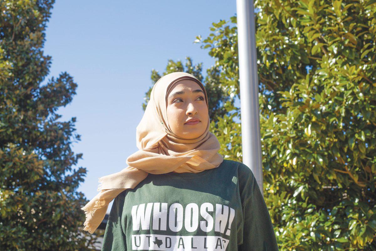 Child development and psychology senior Aminah Khan participates in a service learning class design to teach middle school girls about building confidence. Photo by Madeline Ambrose | Mercury Staff.