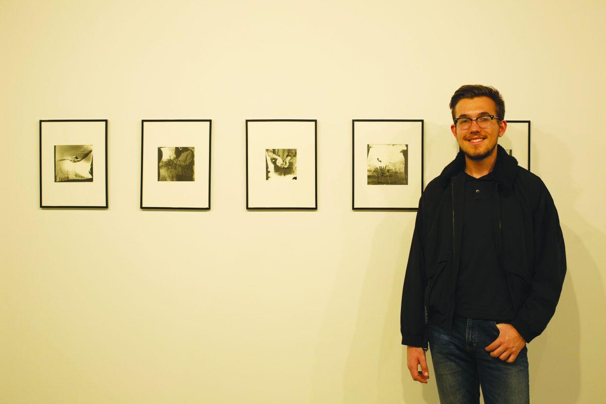 Chemistry junior Zachary Chroust uses darkroom techniques to produce photographs.
Photo by Amina Hussain | Mercury Staff.