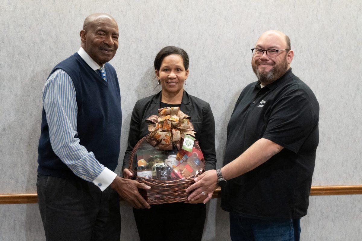 Director of Development and Alumni Affairs Monique Wedderburn (middle), Director of Community Engagement Raul Hinojosa Jr. (right) and Vice President of Diversity and Community Engagement George W. Fair (left) pictured together. Photo by Grace Change | Mercury Staff