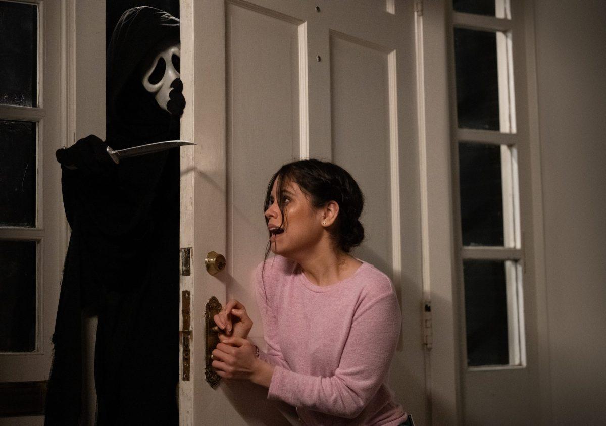 TARA (JENNA ORTEGA) DEFENDS HERSELF AGAINST GHOSTFACE. 'SCREAM'
(2022) PRESENTS A MODERN SPIN ON SLASHER HORROR.
| Photo provided by Paramount Pictures 