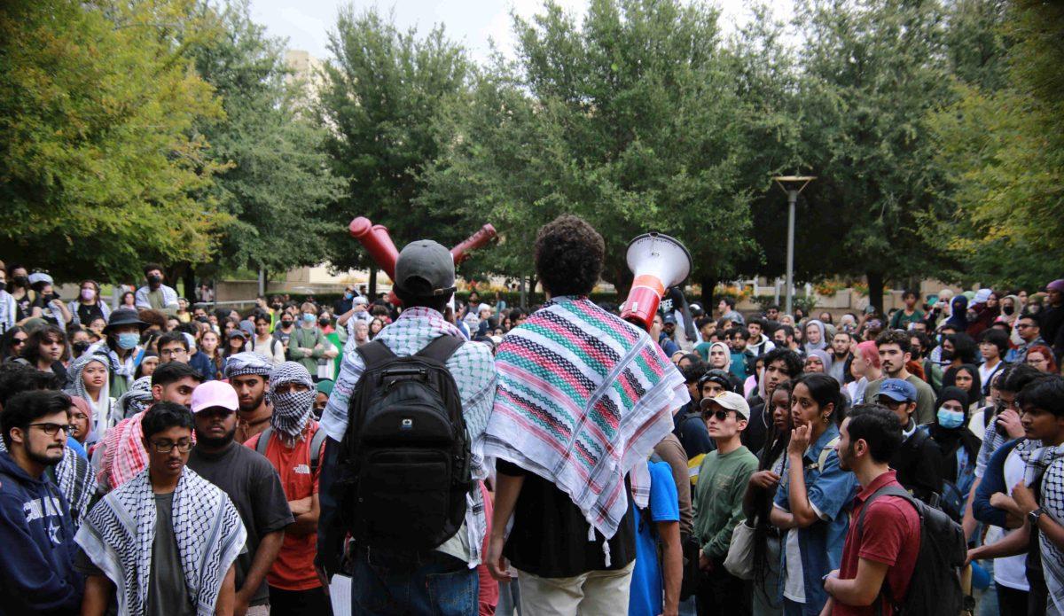 Pictured above are over 300 students gathered at TI Plaza preparing to march across campus in solidarity with Palestine and in protest against an email sent by President Benson on Oct. 16 about the Israel-Hamas war. Below on the left is a Palestinian student who said 12 of her distant cousins, uncles and other family members were killed from airstrikes between Oct. 15 to Oct. 25. "There was a circulating video of a doctor in my family who could not keep his composure at a hospital after finding out his brother and father were murdered," she said. On the right is one of the leaders of the march chanting. All Photos By Surjaditya Sarkar, Jason Sadanandh| Mercury Staff