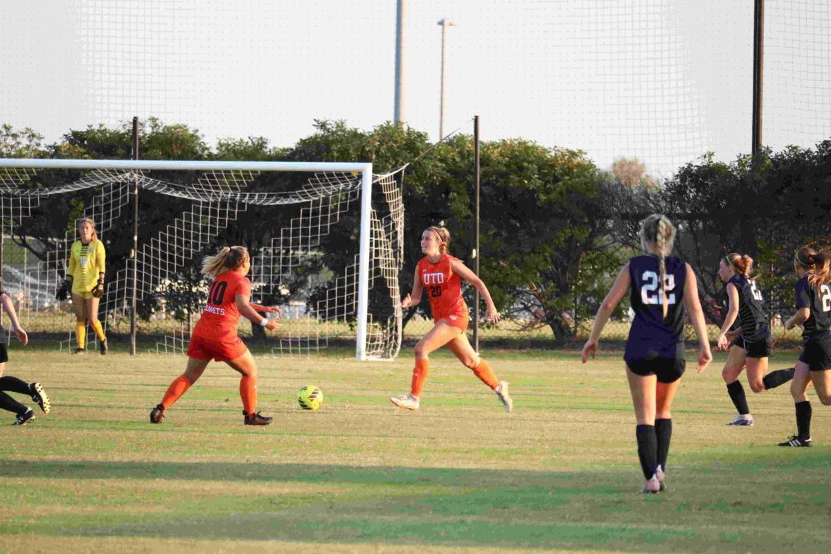 Forward #10 Bella Granada (left) passes to defender #20 Ashleya Farrell (right) while #96 Jade Press (back) stands guard. The Comets have not yet had a goal scored against them. Photo By Ashwin Sangareddypeta | Mercury Staff