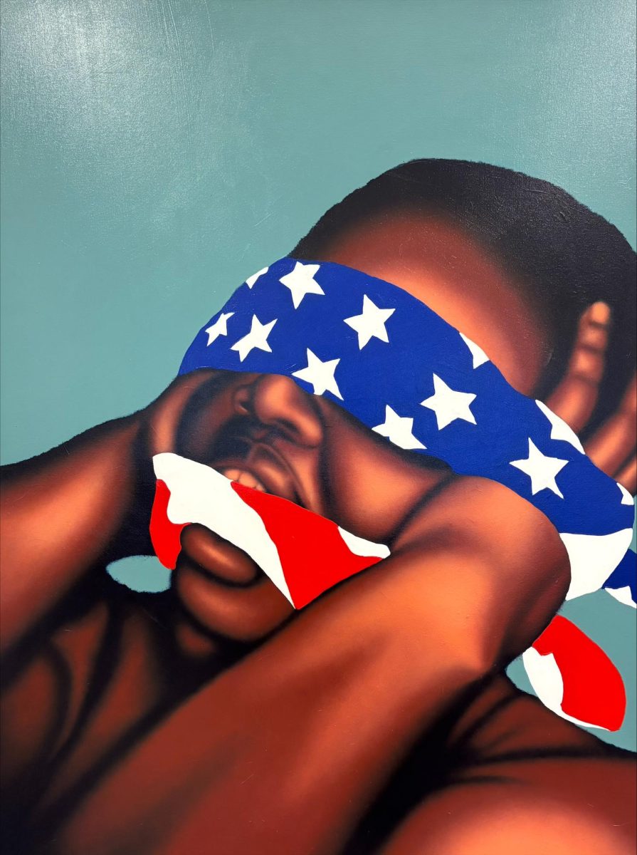 A piece from Dárē Akinwole’s Aluta Continua series features a figure restrained by an American flag. The work explores themes of identity, power and the Black experience in the United States.