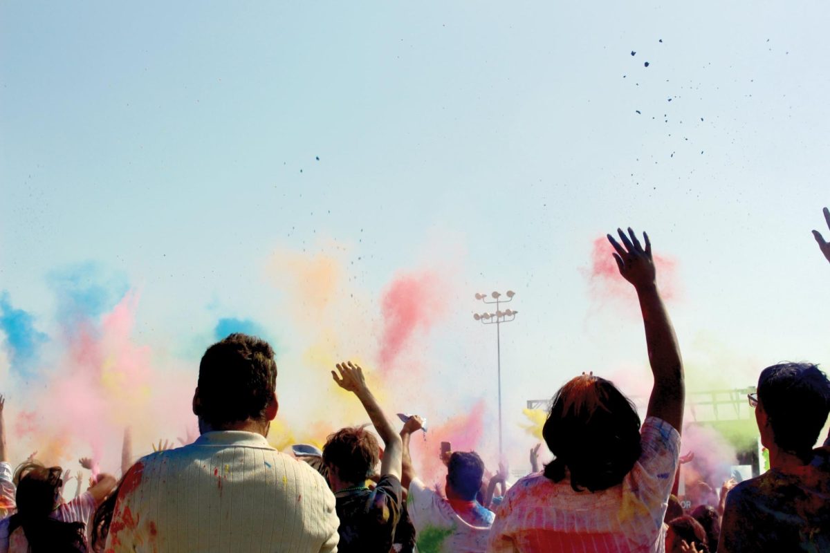 UTD students throw color in the air after the DJ’s countdown. This is part of the Holi celebration that took place on Feb. 28th 2026 at the UTD multipurpose fields.
