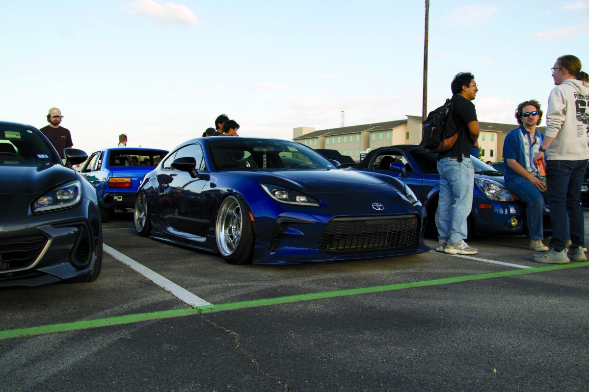 A modified Toyota GR86 parked at Cars and Comets, supporting Dallas Formula Racing.