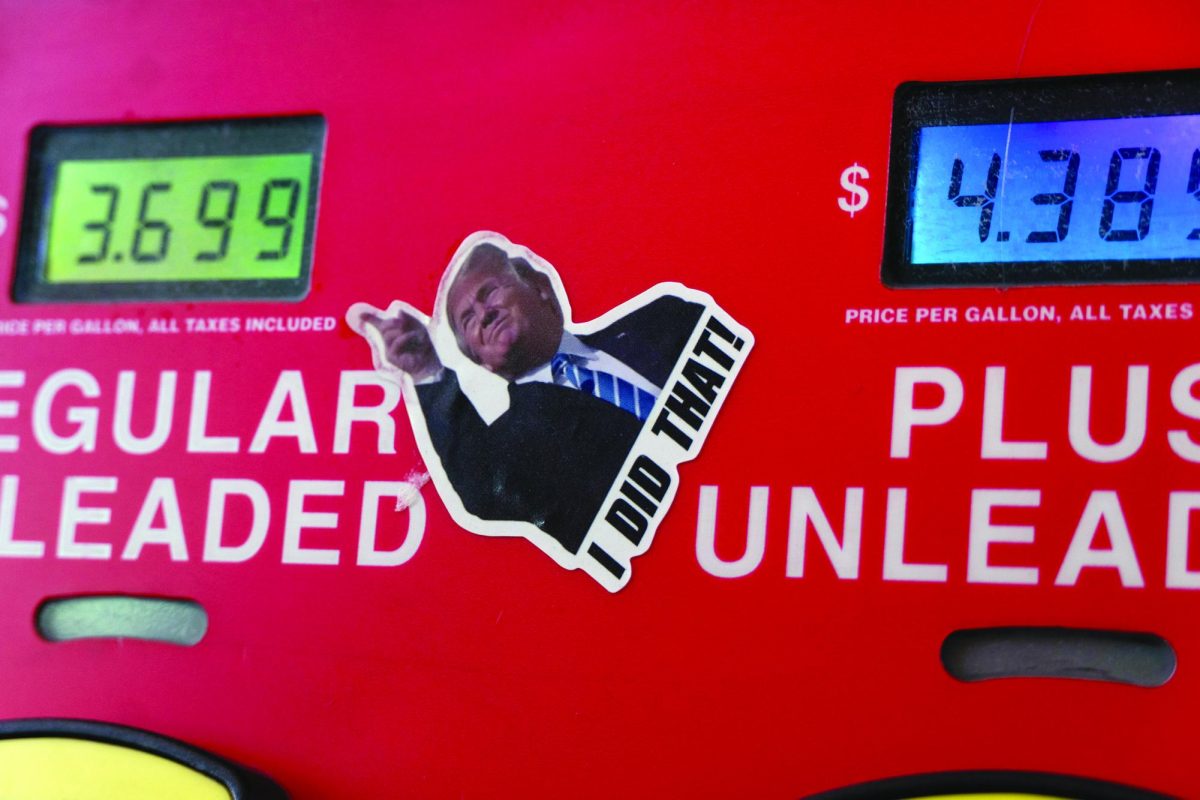 Sticker on gas pump of President Trump captioned "I DID THAT".