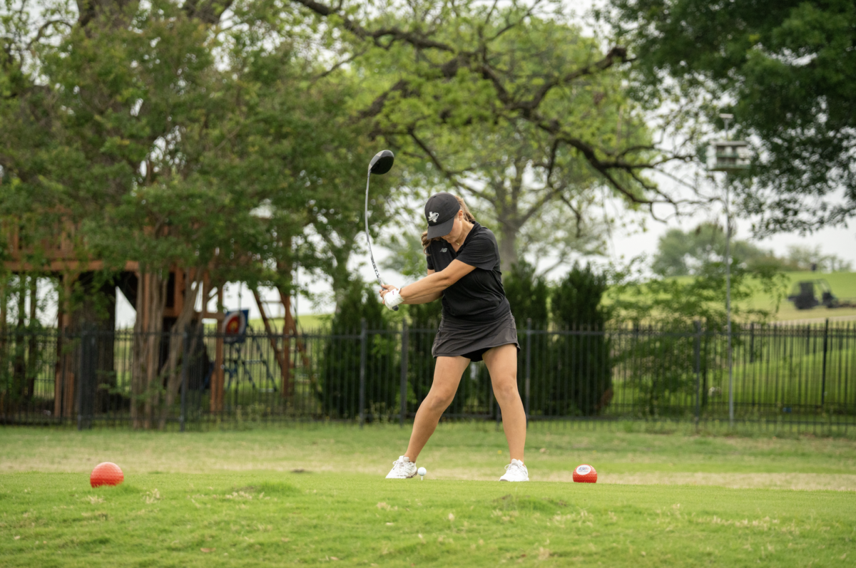 Brook Yount, LSC Champion, tees off from the tee box during the opening round of the tournament. 
