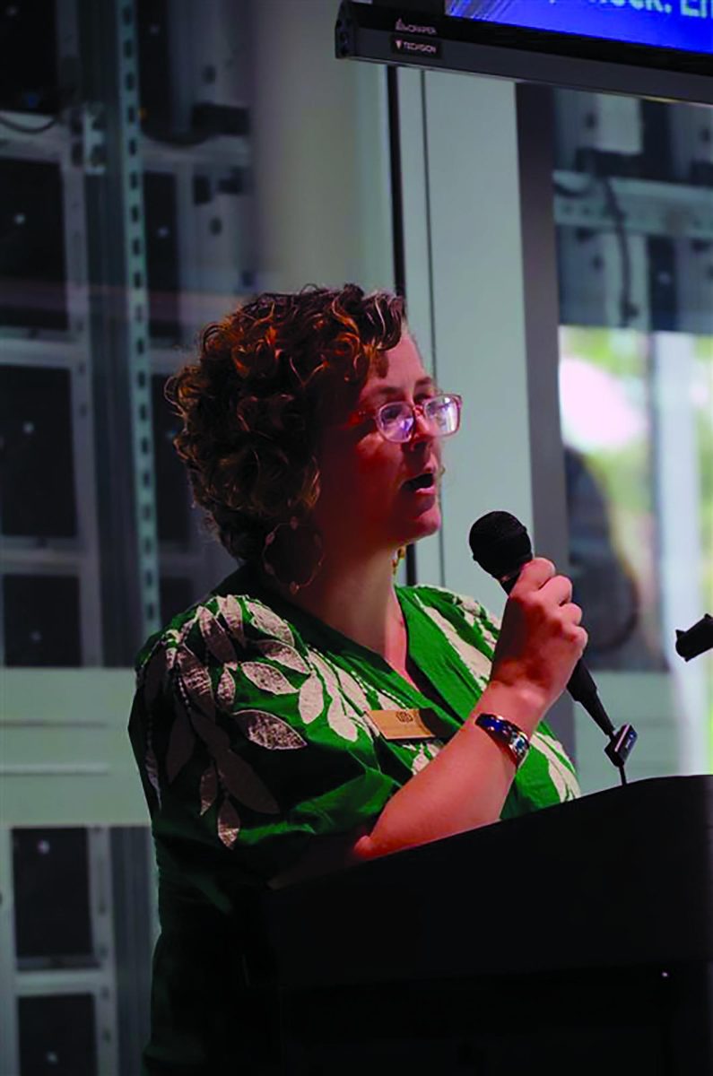 Brandy Wicker delivers closing statements at the Graduate Student Assembly executive debate.  