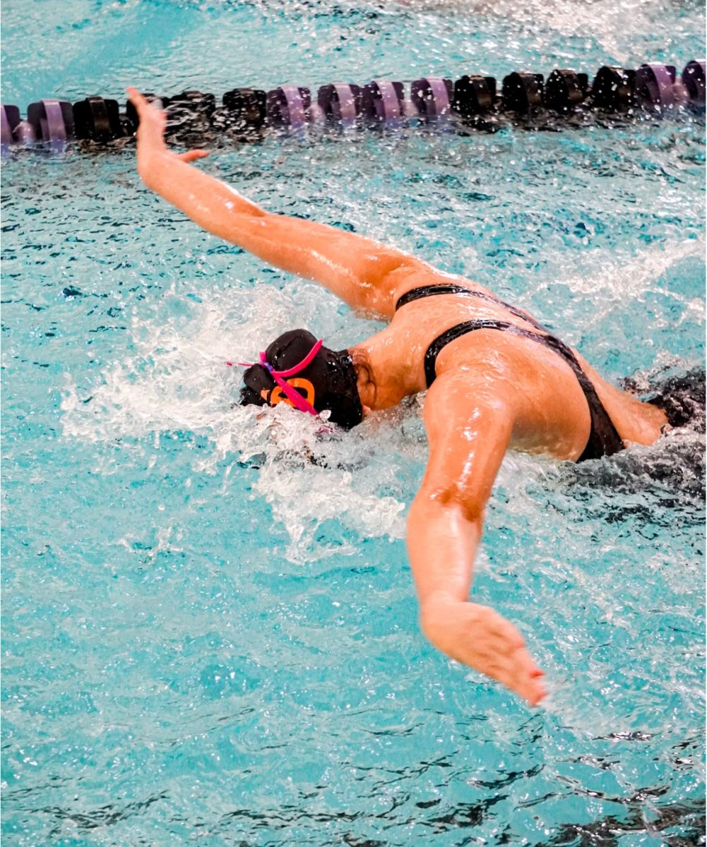 Swimmer Alejandra Jimenez at a meet hosted by UT Dallas.