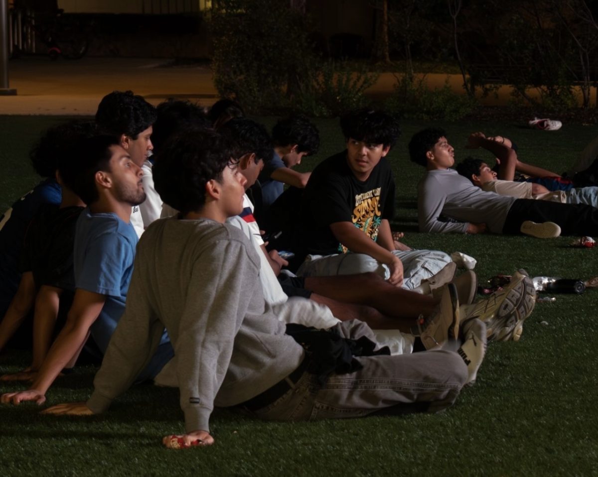 Attendees gather outdoors for the U.S.-Paraguay watch party.